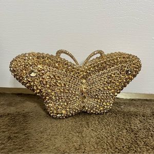 Gold embellished butterfly clutch